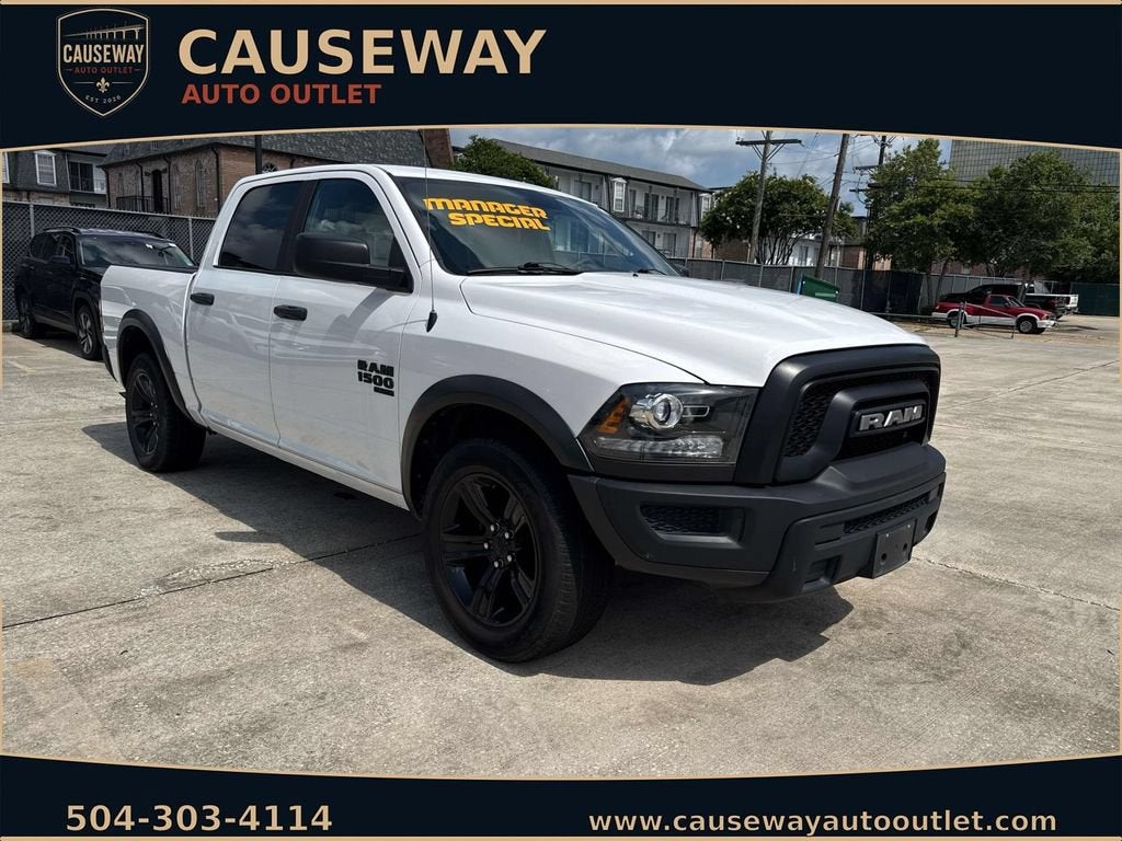 2024 RAM 1500 Classic Warlock in White — front three-quarter view