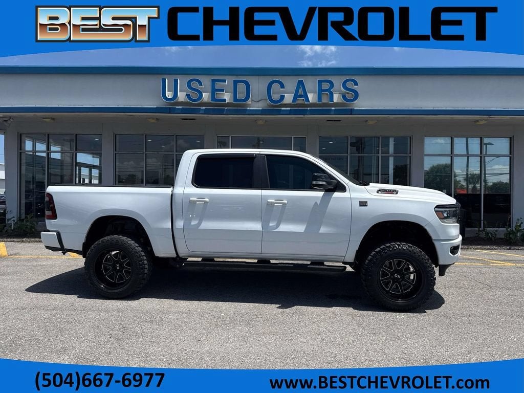2021 RAM 1500 Big Horn in White — front three-quarter view
