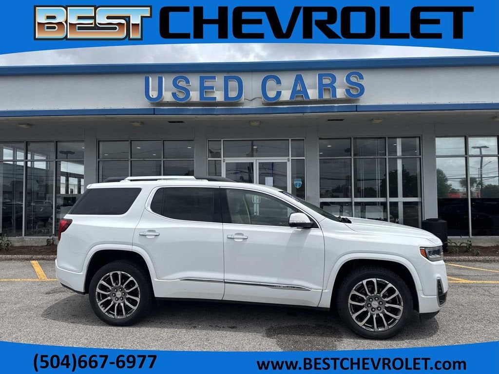 2023 GMC Acadia Denali in Summit White — front three-quarter view