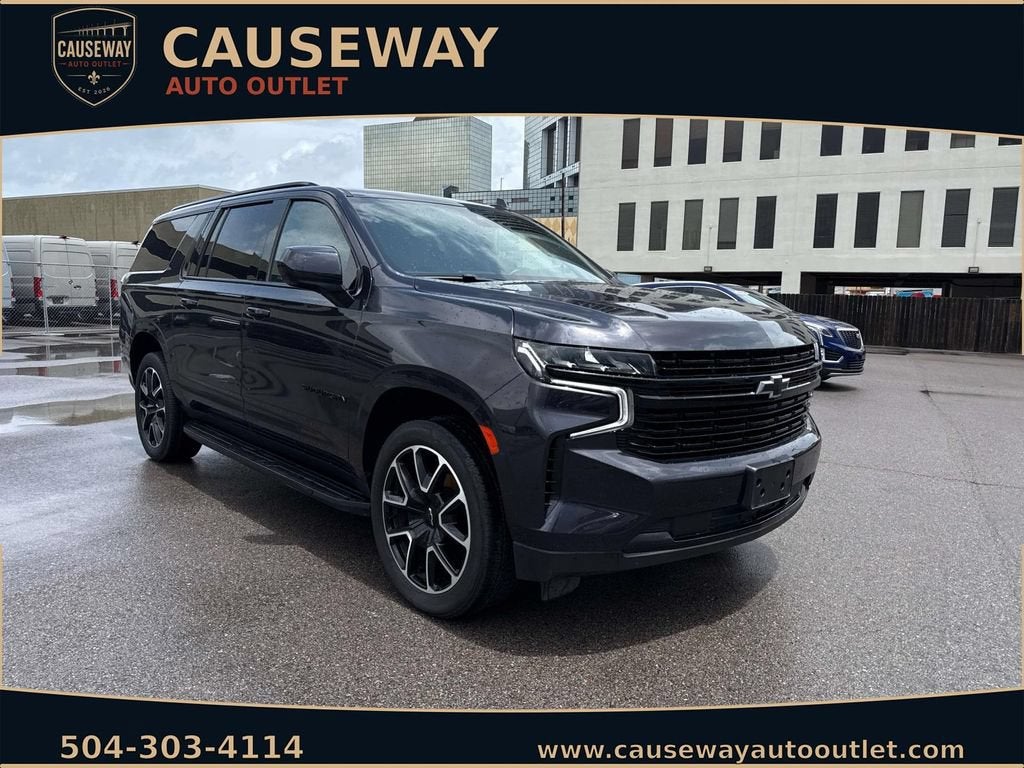 2024 Chevrolet Suburban RST in Dark Ash Metallic — front three-quarter view