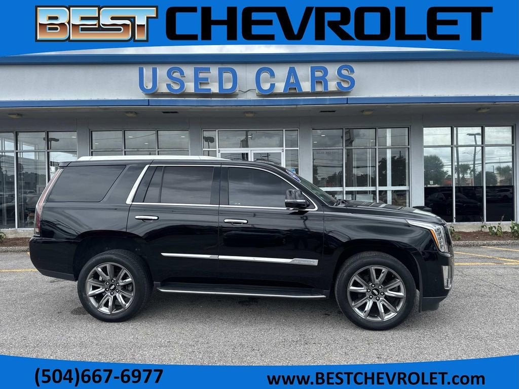 2020 Cadillac Escalade Luxury in Red Passion Tintcoat — front three-quarter view