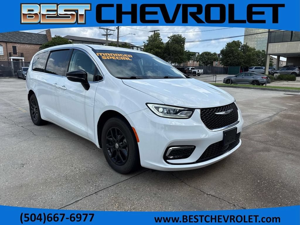 2024 Chrysler Pacifica Touring L in White — front three-quarter view