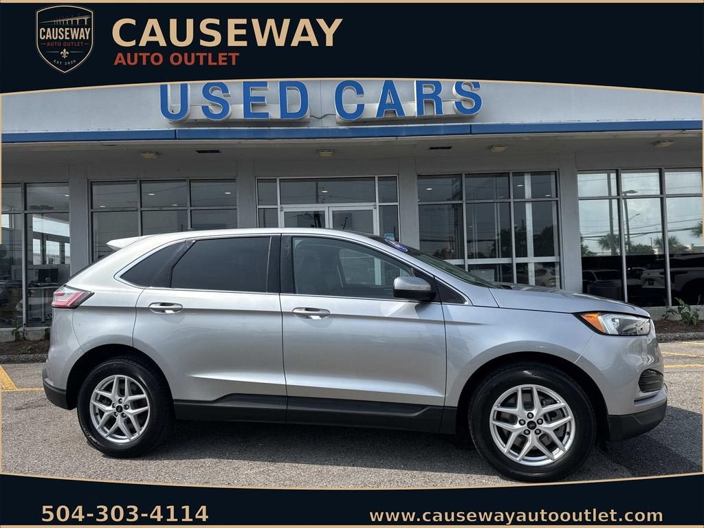 2024 Ford Edge SEL in Silver — front three-quarter view