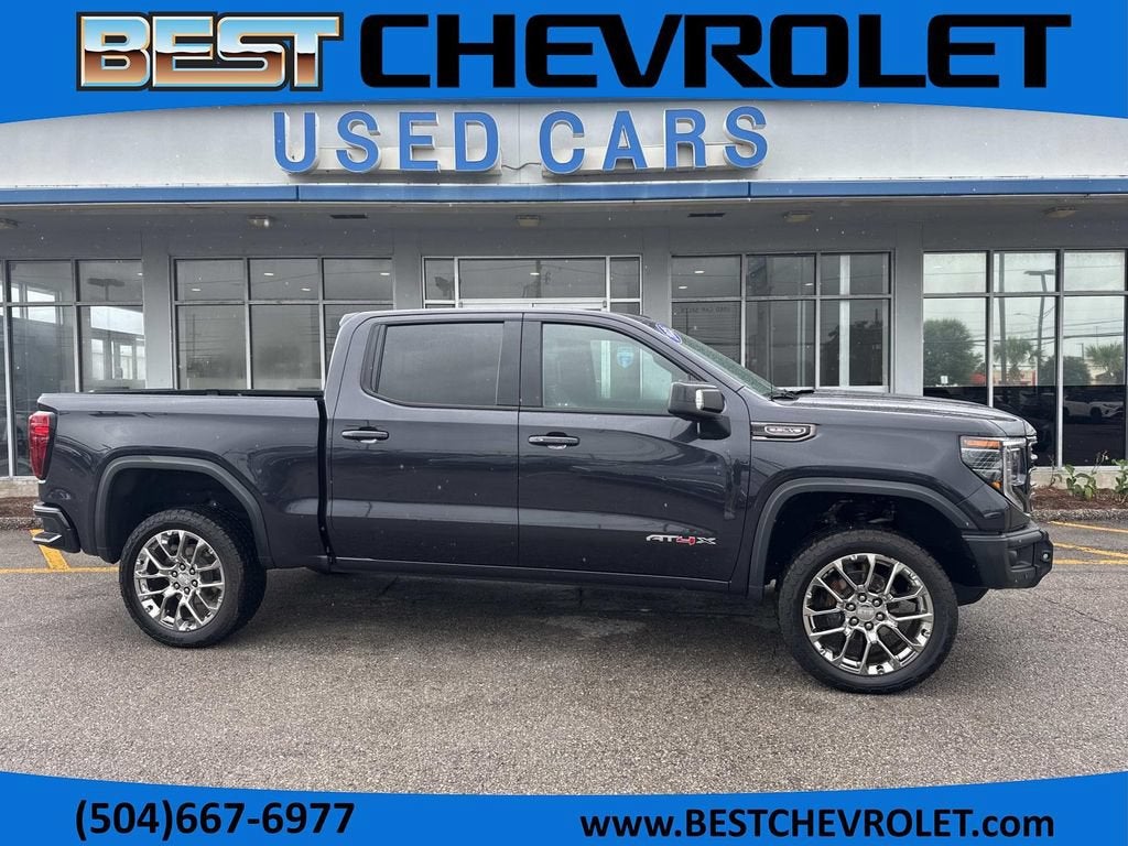 2025 GMC Sierra 1500 AT4X in Titanium Rush Metallic — front three-quarter view