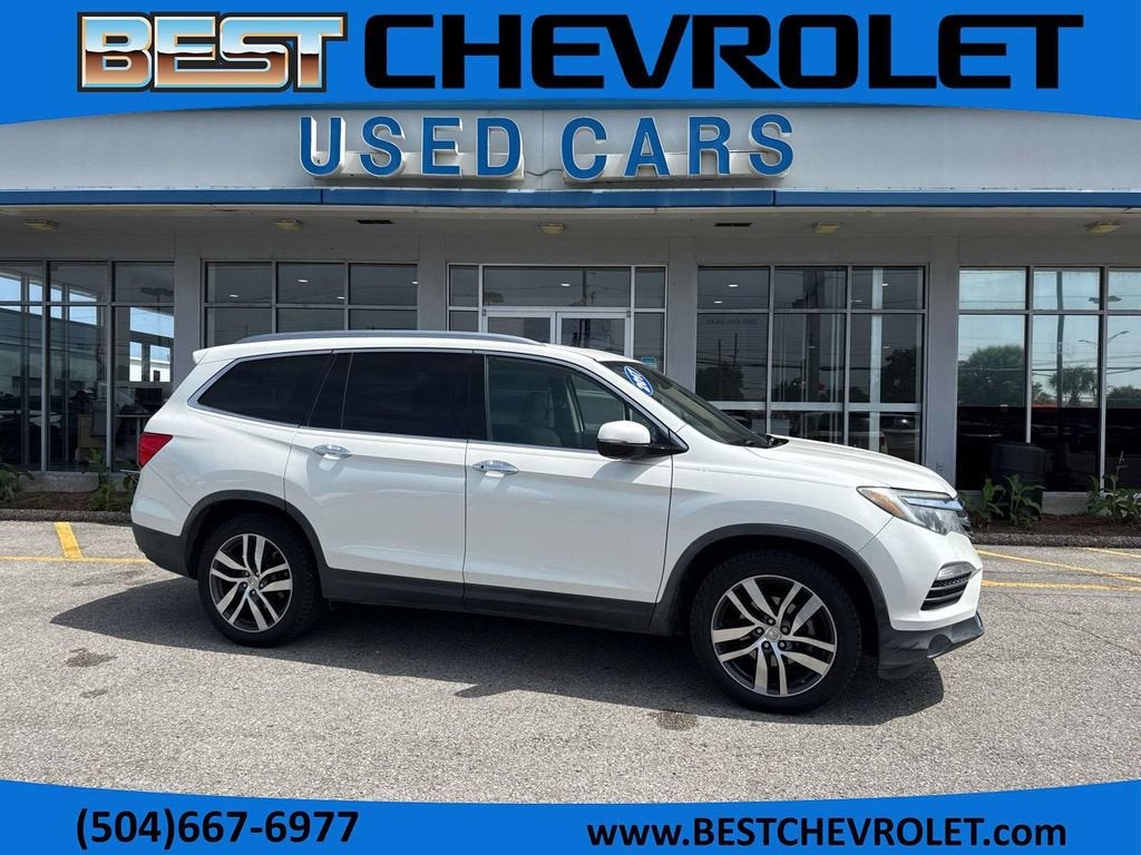 2017 Honda Pilot Elite in White — front three-quarter view