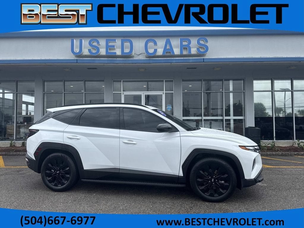 2024 Hyundai Tucson XRT in White — front three-quarter view